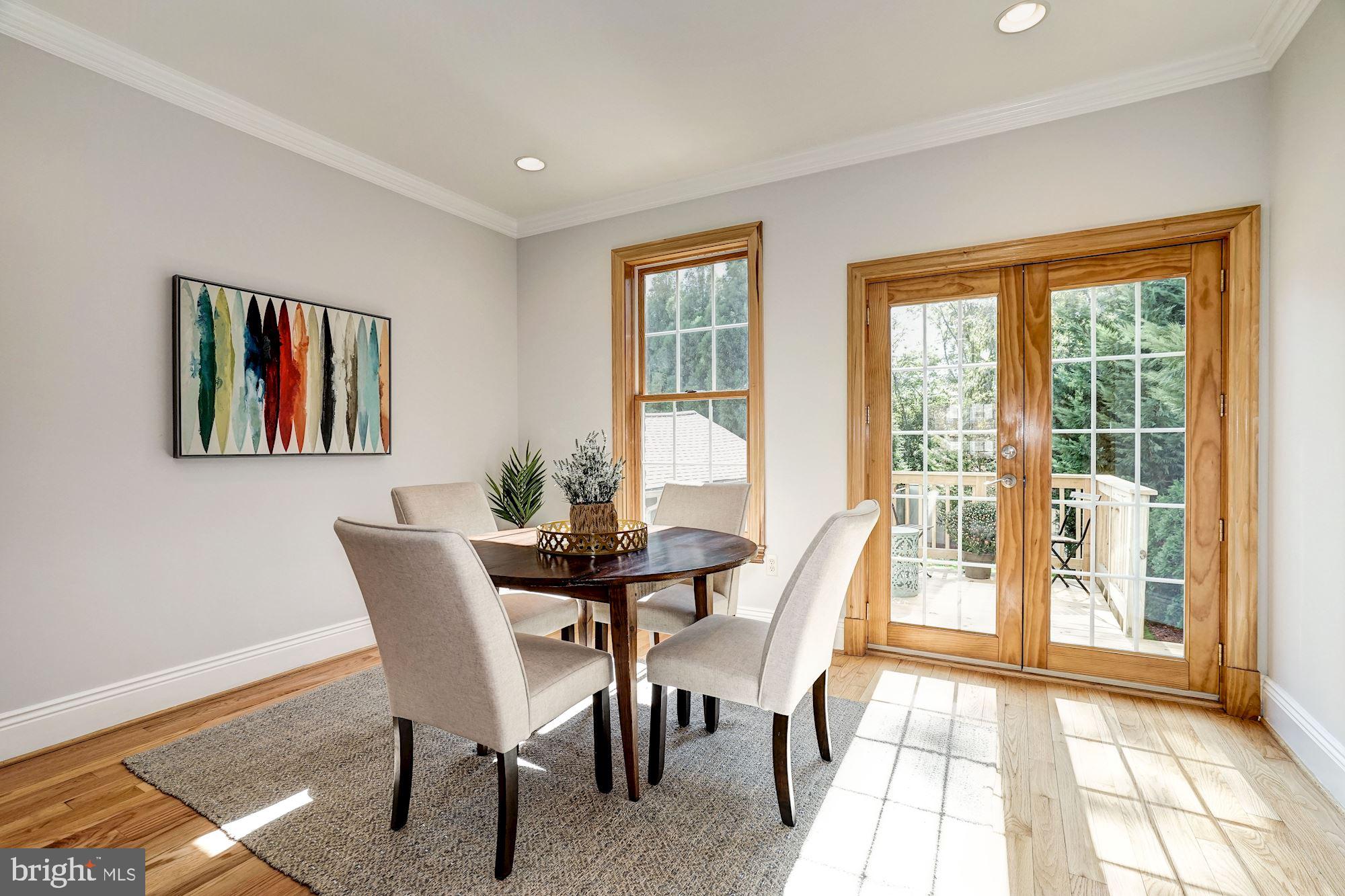 3 Sunset Drive Alexandria, VA 22301 - Photo 10 of 47 a view of a dining room with furniture and a potted plant