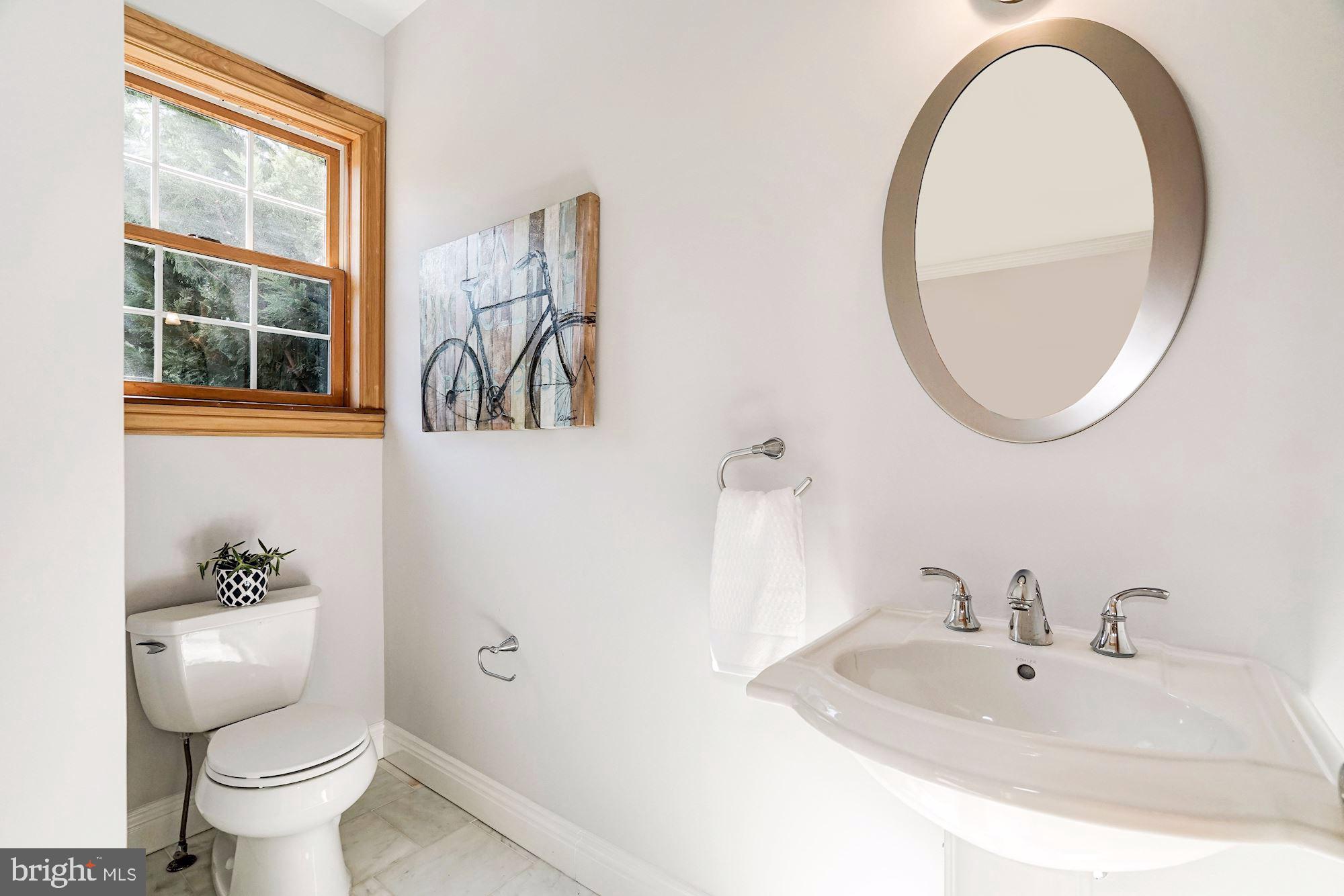 3 Sunset Drive Alexandria, VA 22301 - Photo 12 of 47 a bathroom with a toilet sink and mirror