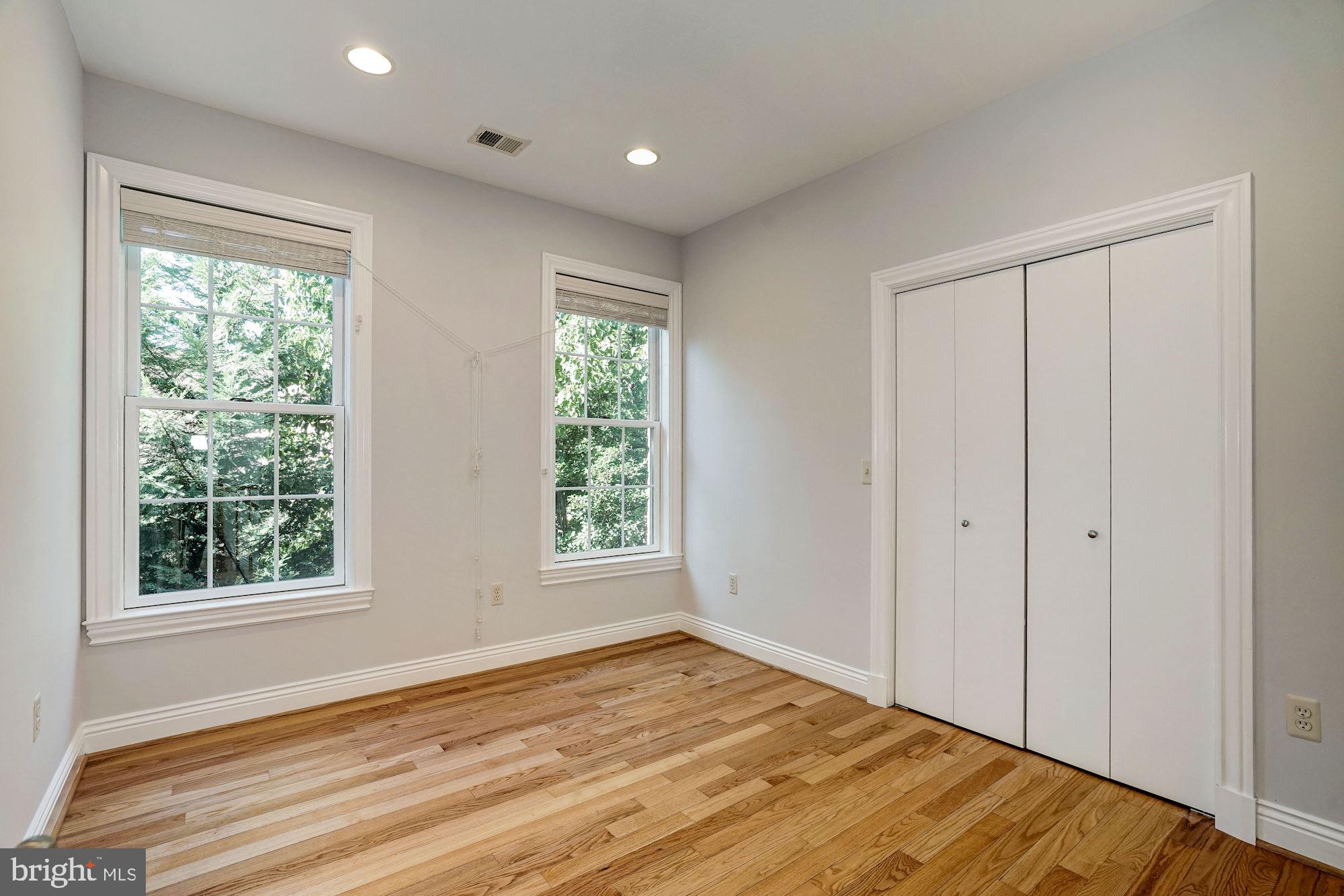 3 Sunset Drive Alexandria, VA 22301 - Photo 15 of 47 a view of empty room with wooden floor and fan