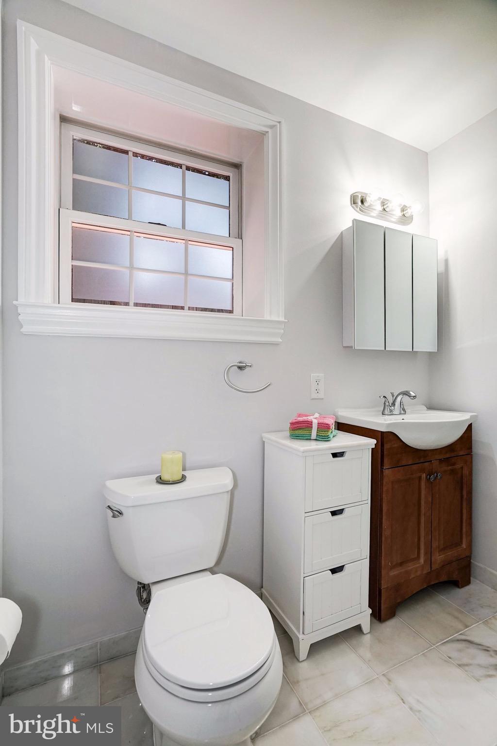 3 Sunset Drive Alexandria, VA 22301 - Photo 29 of 47 a bathroom with a sink a toilet and a vanity