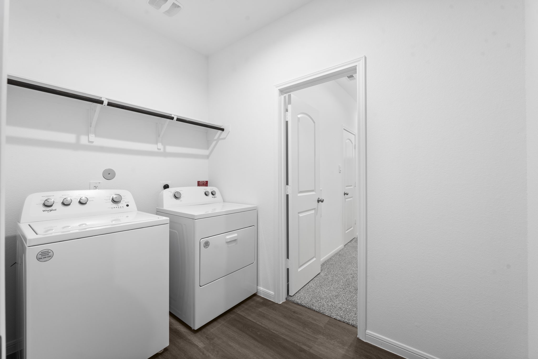 544 Newcomb Hollow Drive Conroe, TX 77304 - Photo 20 of 31 The primary closet is conveniently located next to the laundry room.