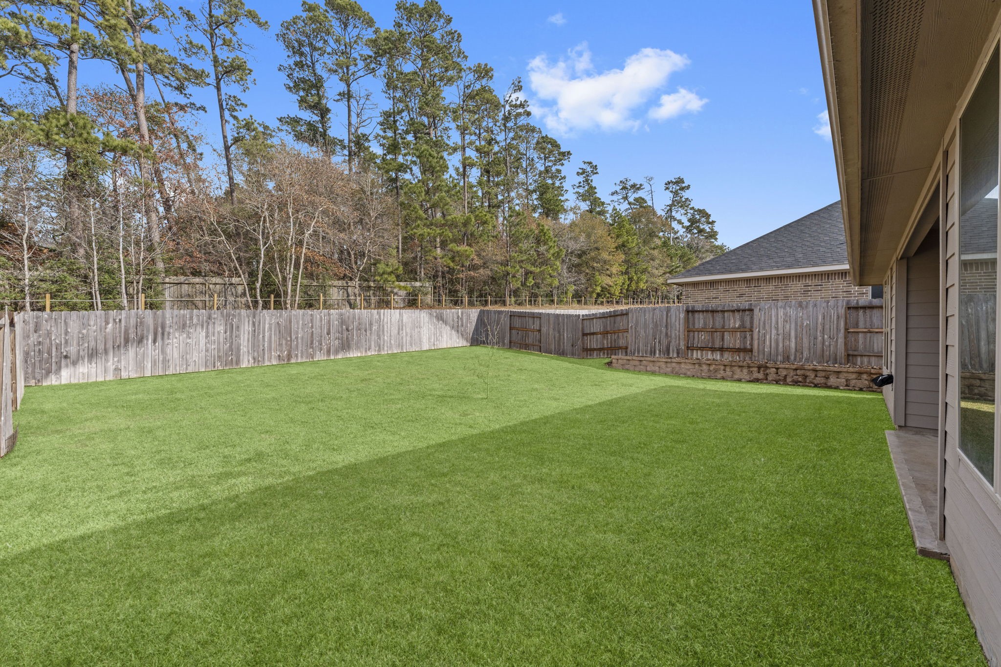 544 Newcomb Hollow Drive Conroe, TX 77304 - Photo 26 of 31 Backyard with NO rear neighbors adding extra privacy.