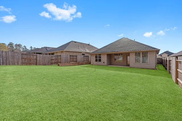 $310,000 | 544 Newcomb Hollow Drive, Conroe, TX 77304