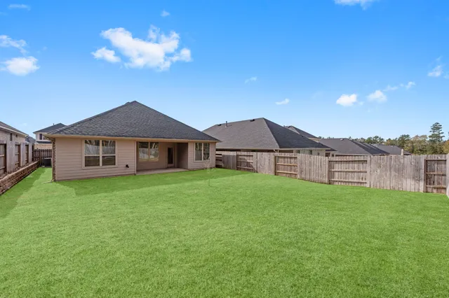 $310,000 | 544 Newcomb Hollow Drive, Conroe, TX 77304