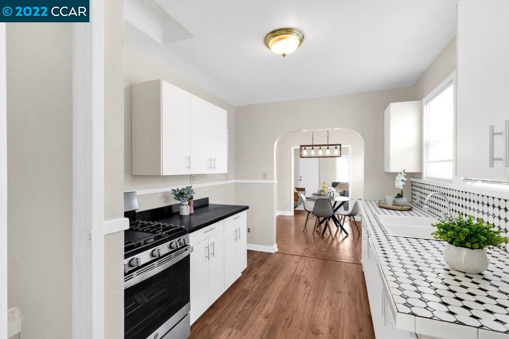 Undisclosed Address Richmond, CA 94801 - Photo 13 of 34 a view of a kitchen and dining room