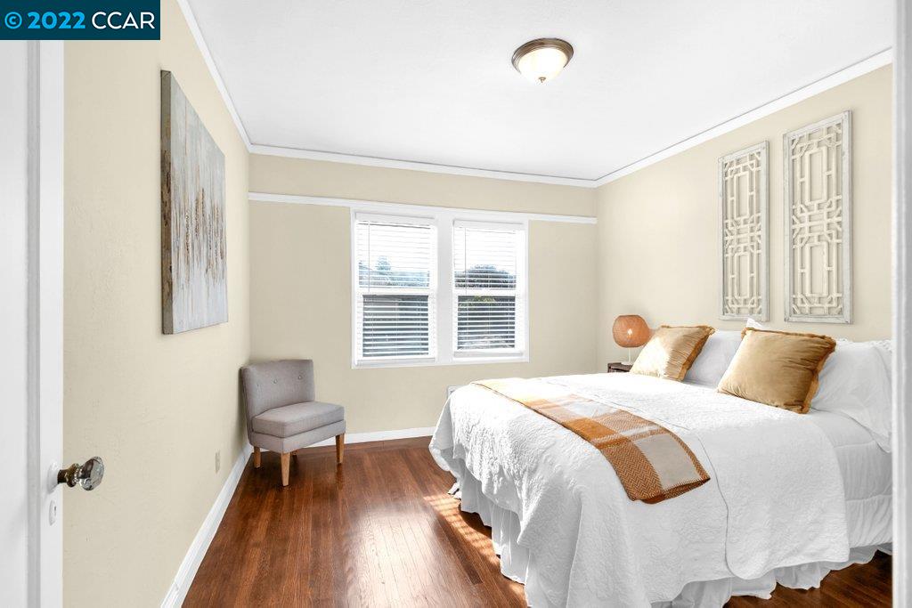 Undisclosed Address Richmond, CA 94801 - Photo 21 of 34 a bedroom with a bed and a window