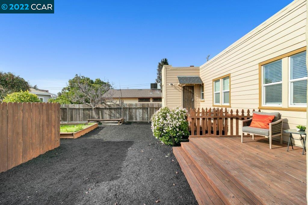 Undisclosed Address Richmond, CA 94801 - Photo 25 of 34 a view of a deck with a yard