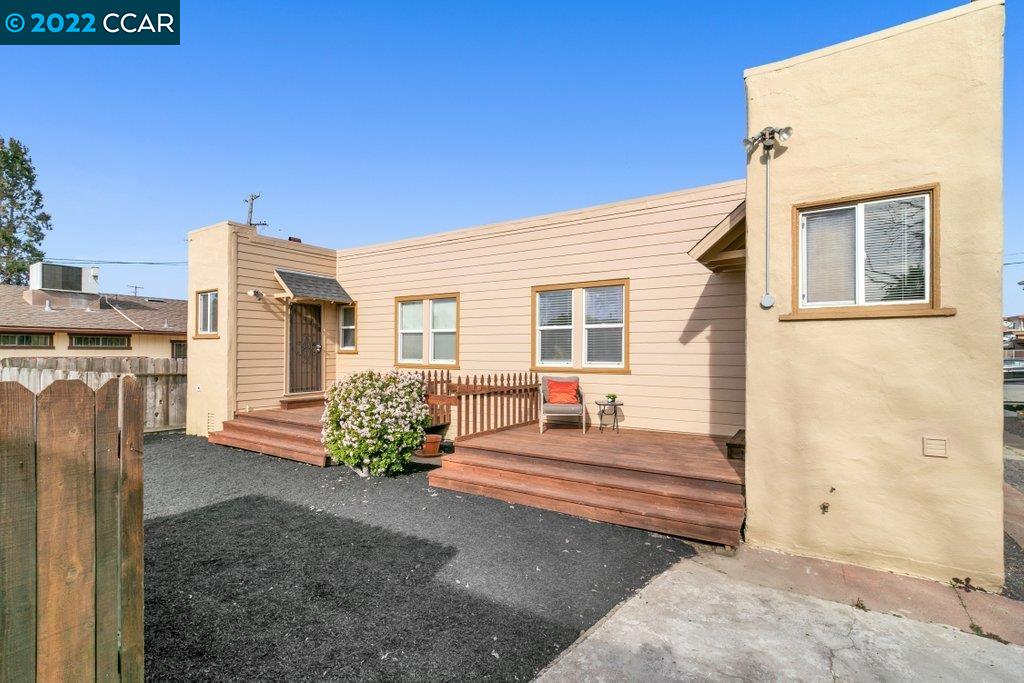 Undisclosed Address Richmond, CA 94801 - Photo 29 of 34 a front view of a house with large windows