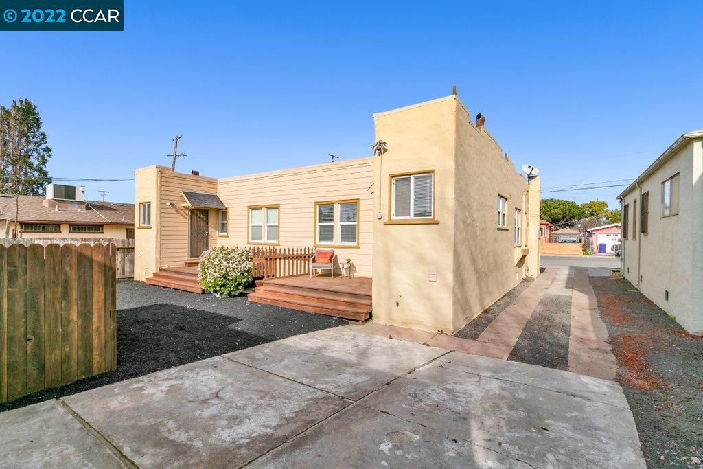 Undisclosed Address Richmond, CA 94801 - Photo 30 of 34 a view of a house with backyard and sitting area