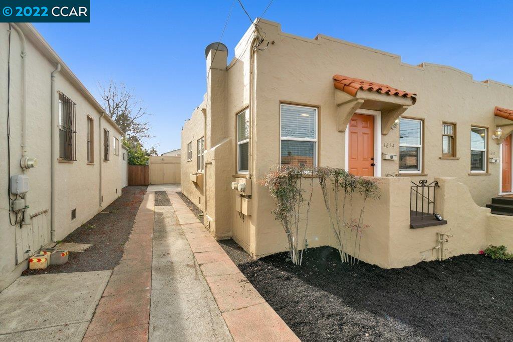 Undisclosed Address Richmond, CA 94801 - Photo 32 of 34 a view of a street with a building in the background