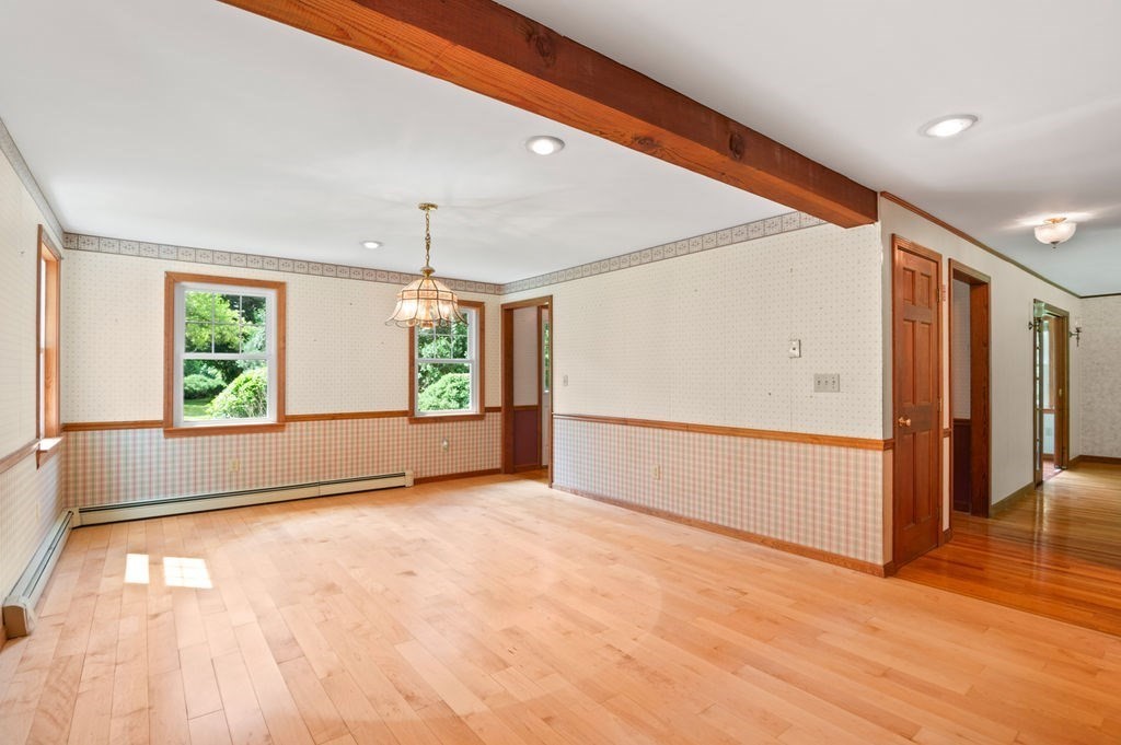 20 Longbrook Road Newbury, MA 01922 - Photo 13 of 41 a view of an empty room with wooden floor and a window