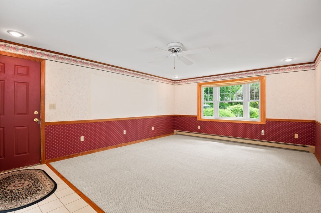 20 Longbrook Road Newbury, MA 01922 - Photo 14 of 41 a view of empty room with wooden floor and fan