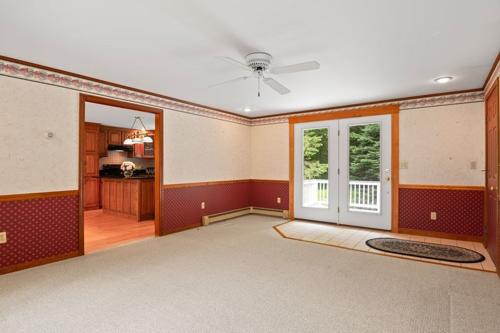 20 Longbrook Road Newbury, MA 01922 - Photo 15 of 41 an empty room with windows and chandelier