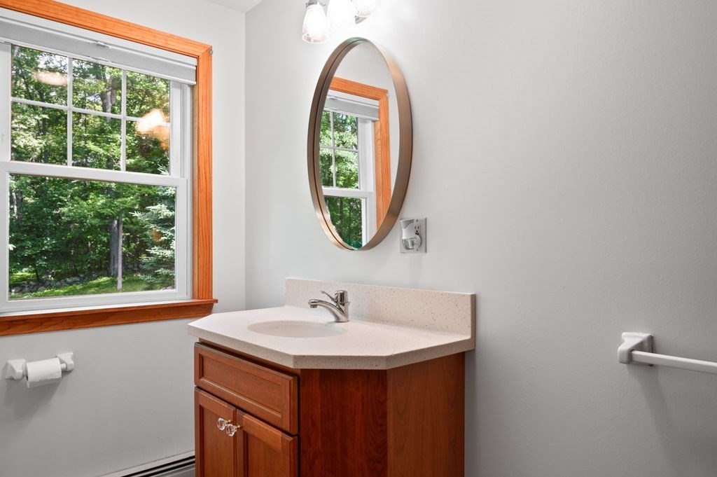 20 Longbrook Road Newbury, MA 01922 - Photo 16 of 41 a bathroom with a sink and a mirror