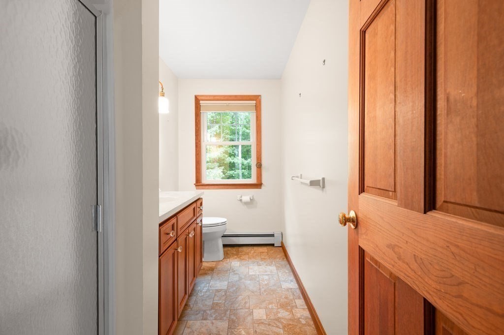 20 Longbrook Road Newbury, MA 01922 - Photo 22 of 41 a view of a hallway with wooden floor and staircase