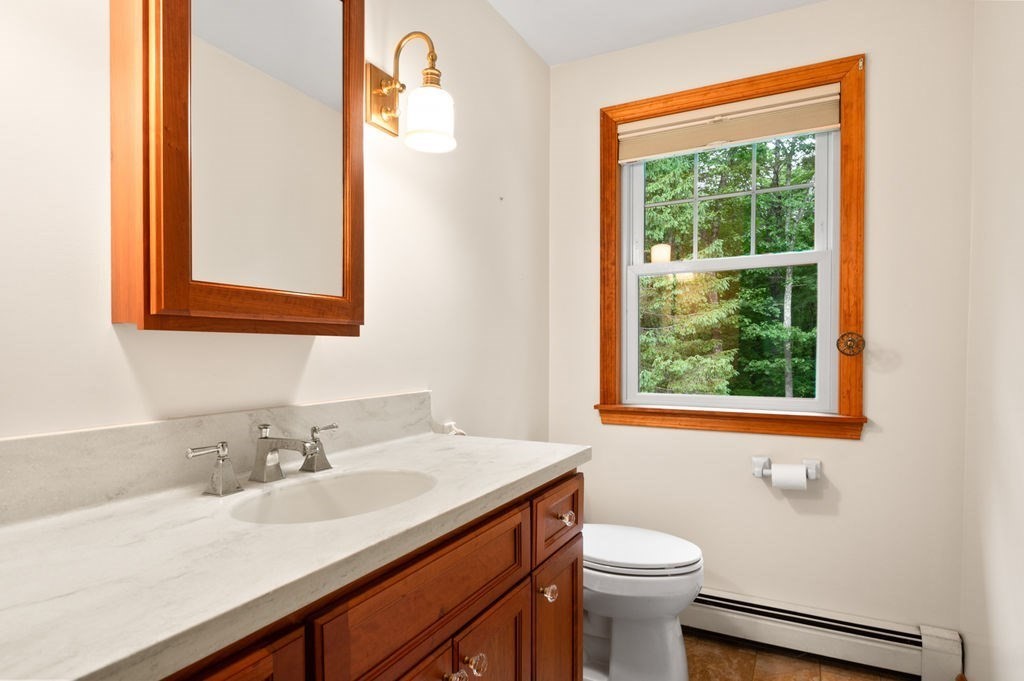 20 Longbrook Road Newbury, MA 01922 - Photo 23 of 41 a bathroom with a sink a toilet and a window
