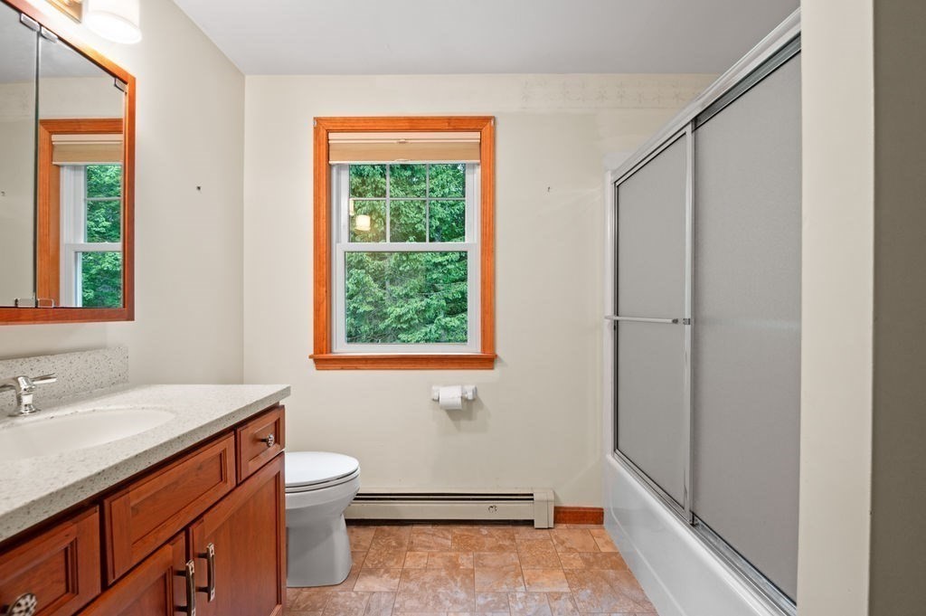 20 Longbrook Road Newbury, MA 01922 - Photo 30 of 41 a bathroom with a sink a toilet and shower