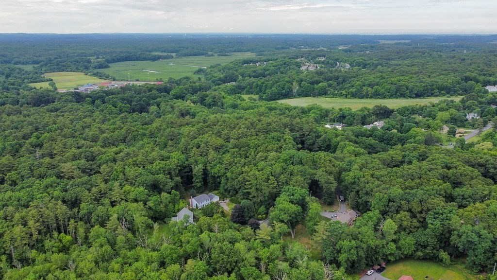 20 Longbrook Road Newbury, MA 01922 - Photo 37 of 41 an aerial view of green landscape with trees houses and mountain view