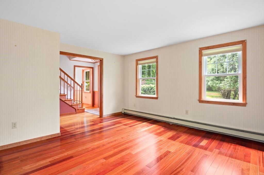 20 Longbrook Road Newbury, MA 01922 - Photo 7 of 41 an empty room with wooden floor and windows