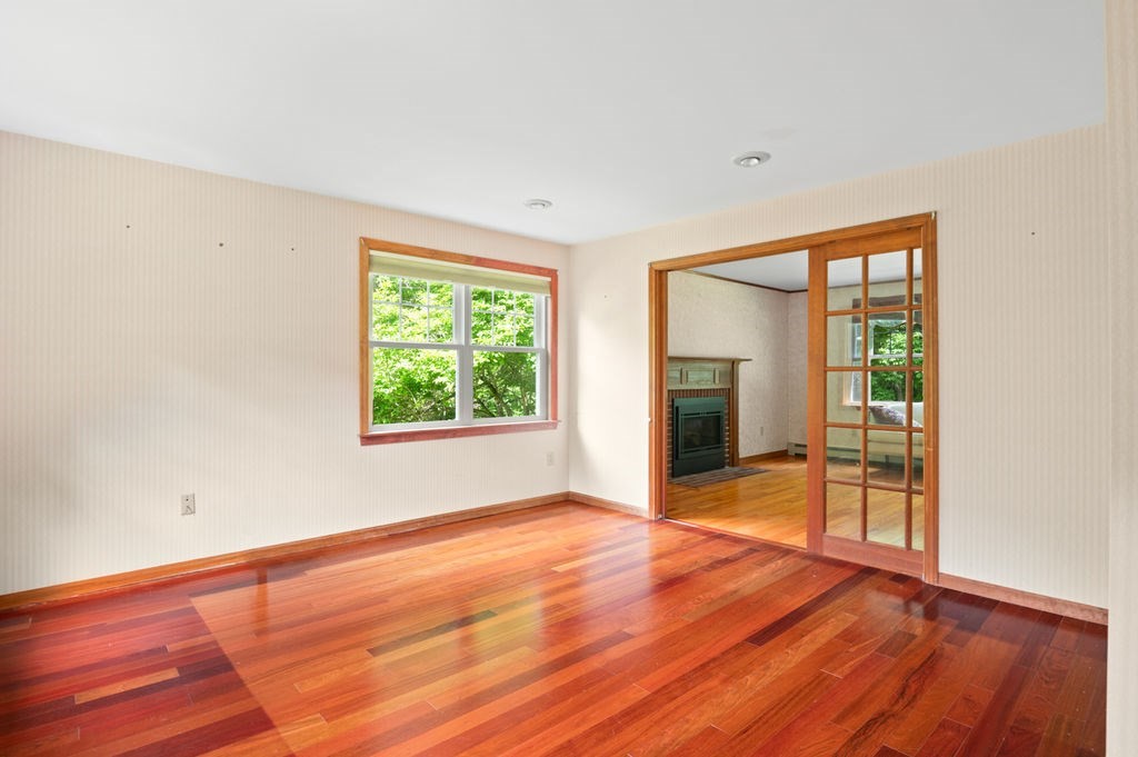 20 Longbrook Road Newbury, MA 01922 - Photo 8 of 41 a view of an empty room with wooden floor and a window