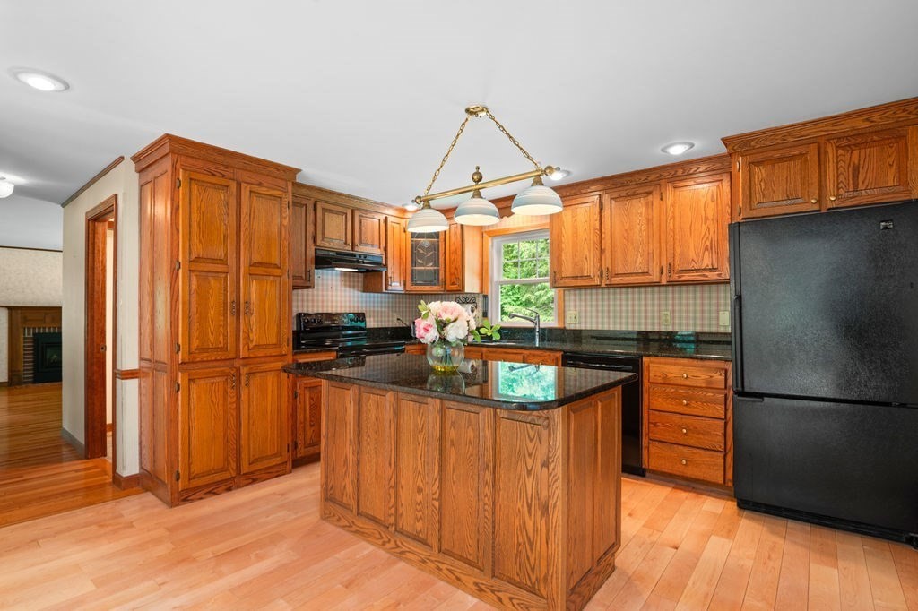 20 Longbrook Road Newbury, MA 01922 - Photo 10 of 41 a kitchen with stainless steel appliances granite countertop a refrigerator a sink dishwasher a stove and a refrigerator