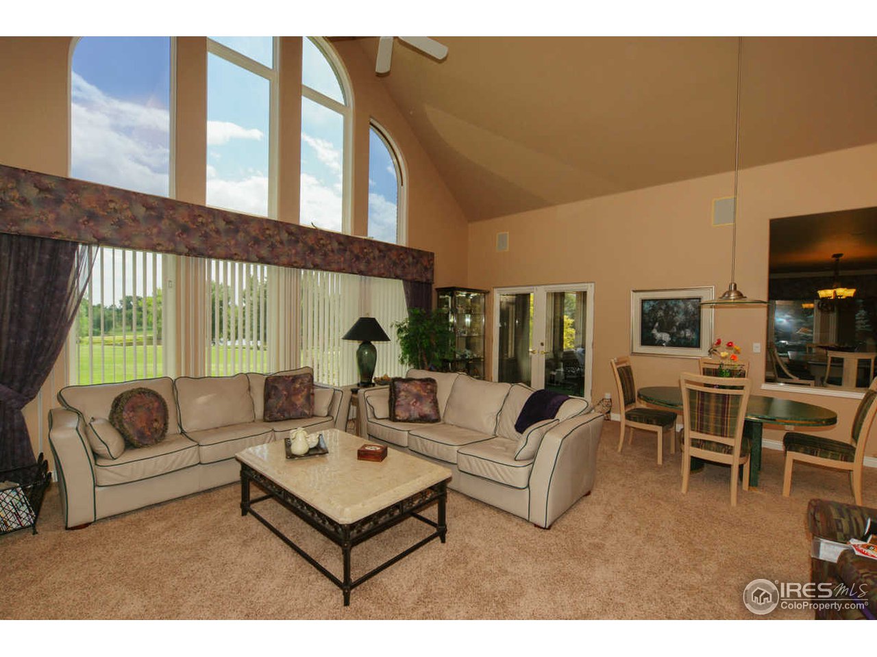 7122 Old Post Road Boulder, CO 80301 - Photo 8 of 22 Living room has wall of windows