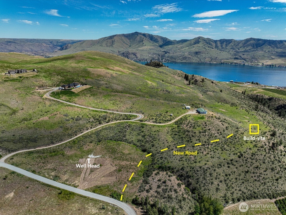 215 Chelan Ranch Road Chelan, WA 98816 - Photo 2 of 6 a view of an ocean from a balcony