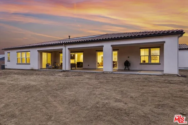 a view of outdoor space yard and front view of a house