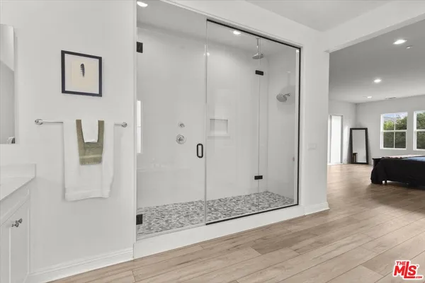 a view of a bathroom with a shower