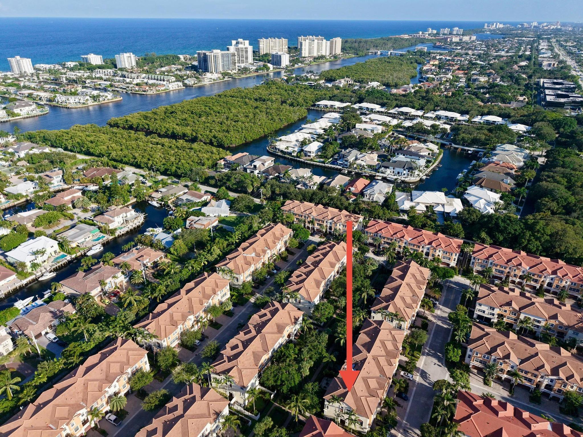 5600 Northeast Trieste Terrace Boca Raton, FL 33487 - Photo 2 of 44 an aerial view of multiple house