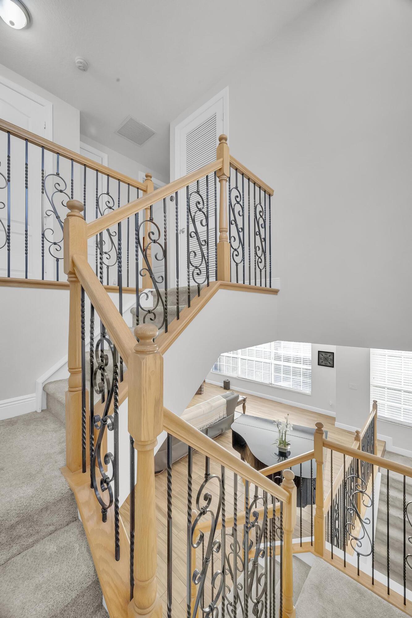 5600 Northeast Trieste Terrace Boca Raton, FL 33487 - Photo 24 of 44 a view of an entryway with wooden floor