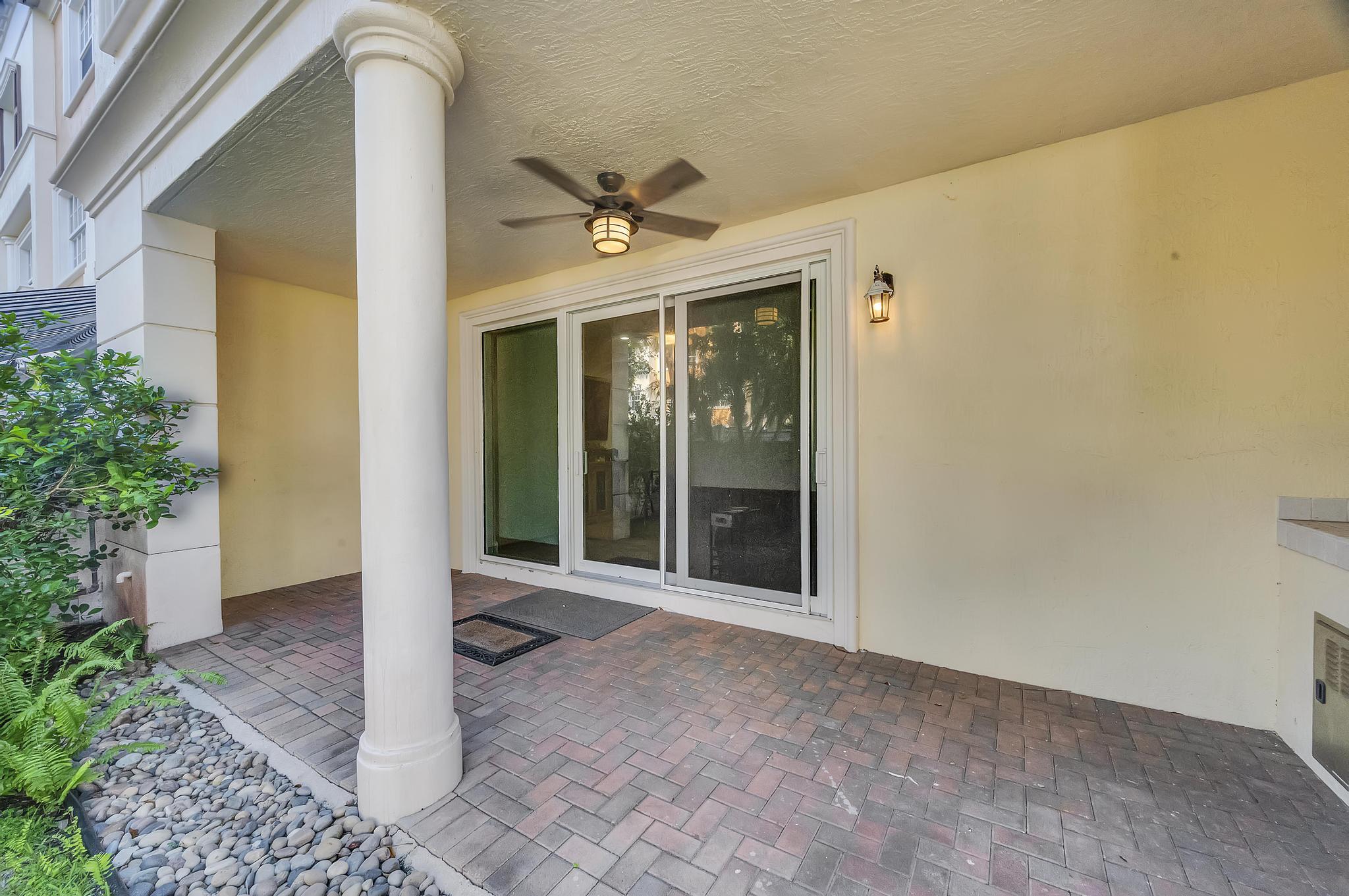 5600 Northeast Trieste Terrace Boca Raton, FL 33487 - Photo 36 of 44 a view of a entryway door front of house