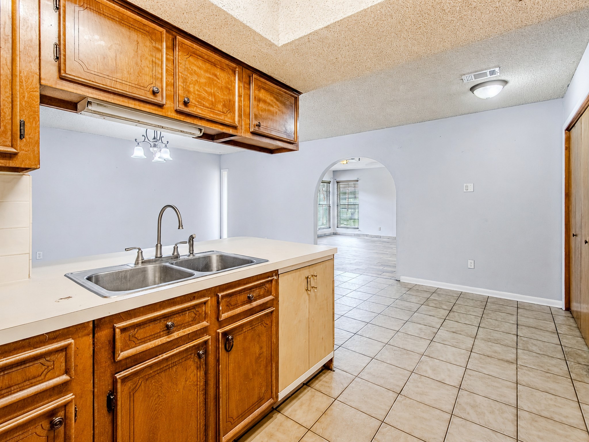 2710 Burke Road Pasadena, TX 77502 - Photo 16 of 38 Additional kitchen view highlighting ample cabinet storage
