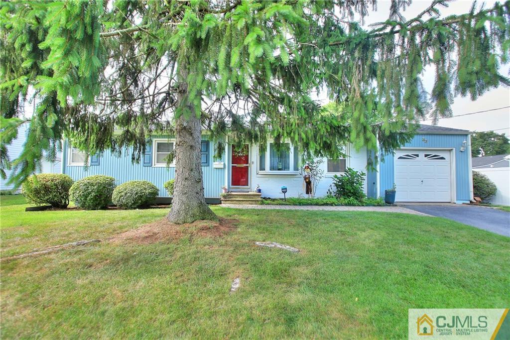 33 Glen Gary Road Middlesex, NJ 08846 - Photo 2 of 25 a front view of house with yard and trees