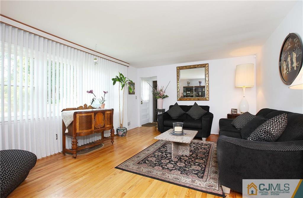 33 Glen Gary Road Middlesex, NJ 08846 - Photo 7 of 25 a living room with furniture and a window