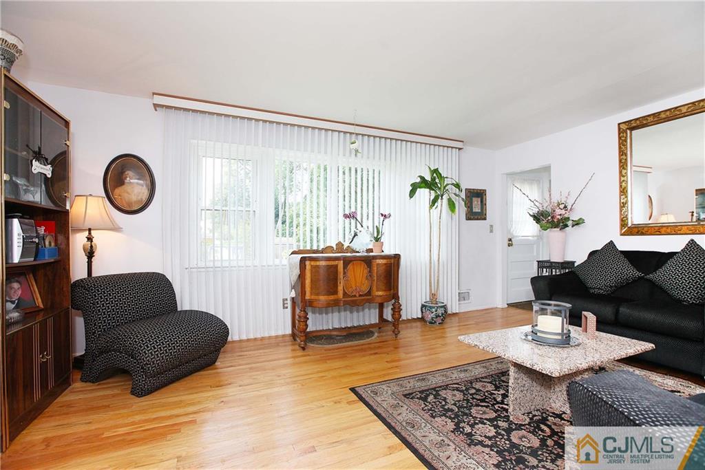 33 Glen Gary Road Middlesex, NJ 08846 - Photo 8 of 25 a living room with furniture and a rug