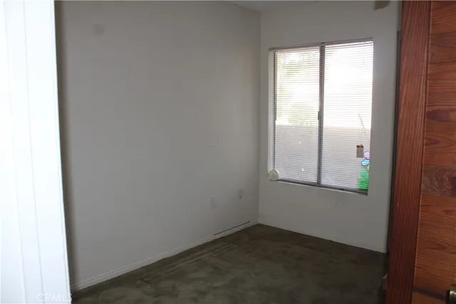 a room with window and closet