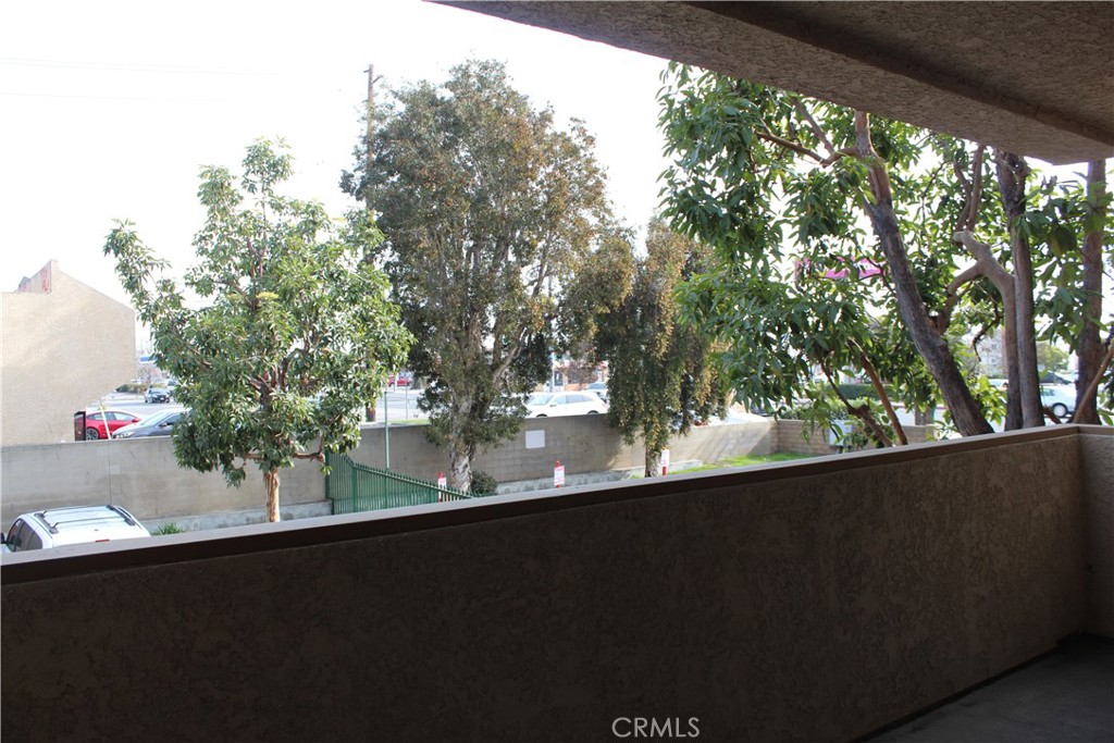 12141 Centralia Street, Unit 119 Lakewood, CA 90715 - Photo 21 of 31 a view of a tree in a window