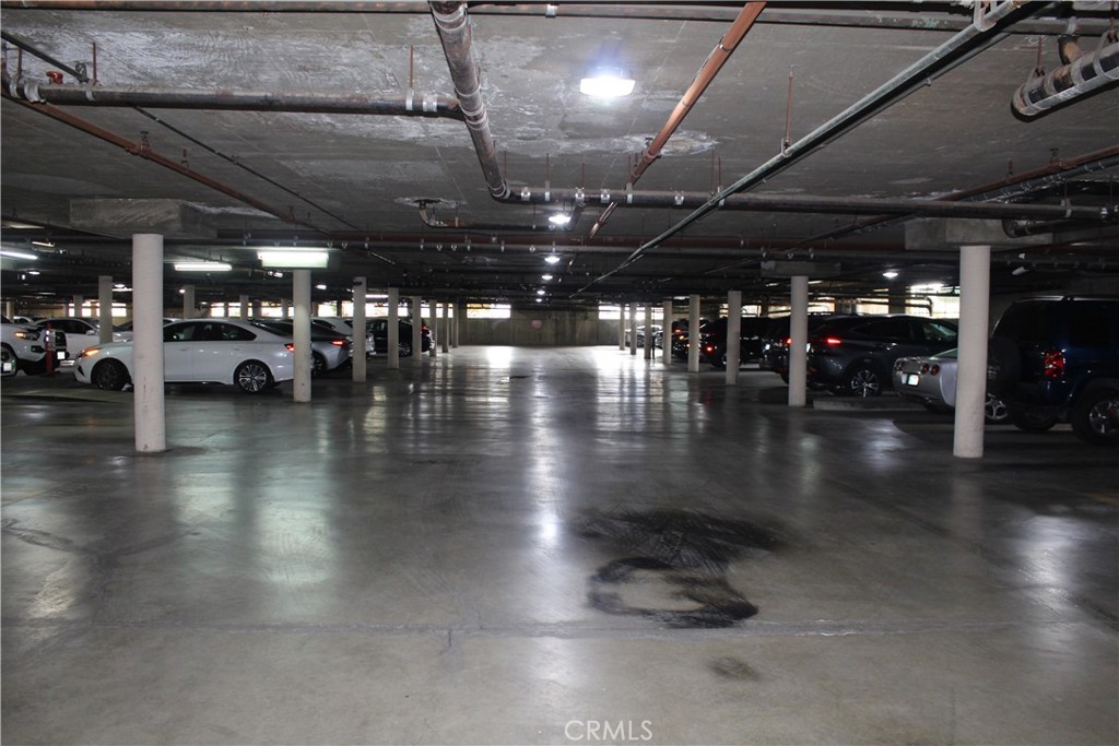 12141 Centralia Street, Unit 119 Lakewood, CA 90715 - Photo 31 of 31 a view of a hall with gym equipment
