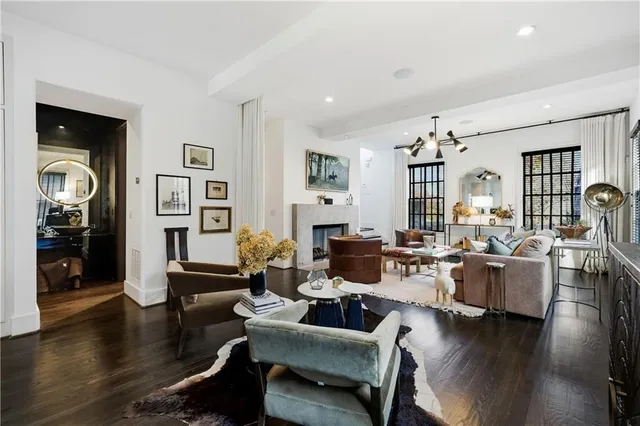 a kitchen with kitchen island a sink table and chairs