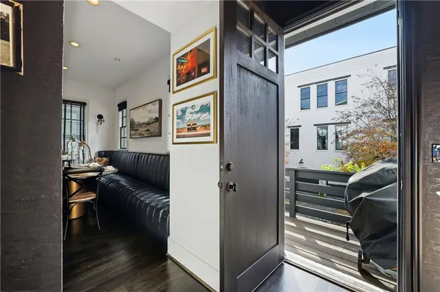 a bathroom with a toilet a sink and a mirror