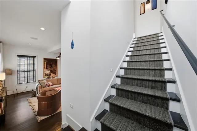 a spacious bathroom with a double vanity sink and a large mirror