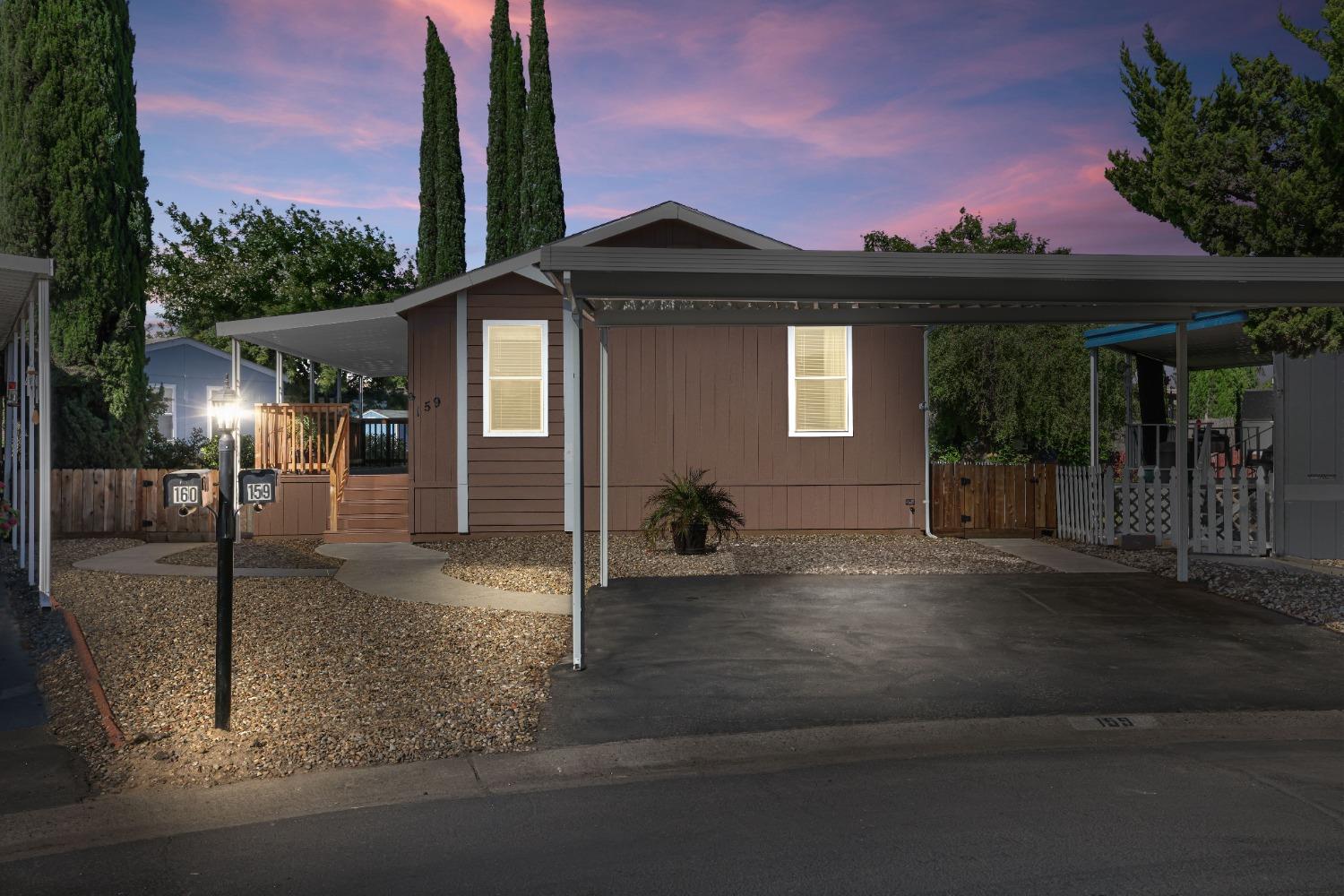 159 Clipper Lane Modesto, CA 95356 - Photo 1 of 1 a front view of a house with a yard