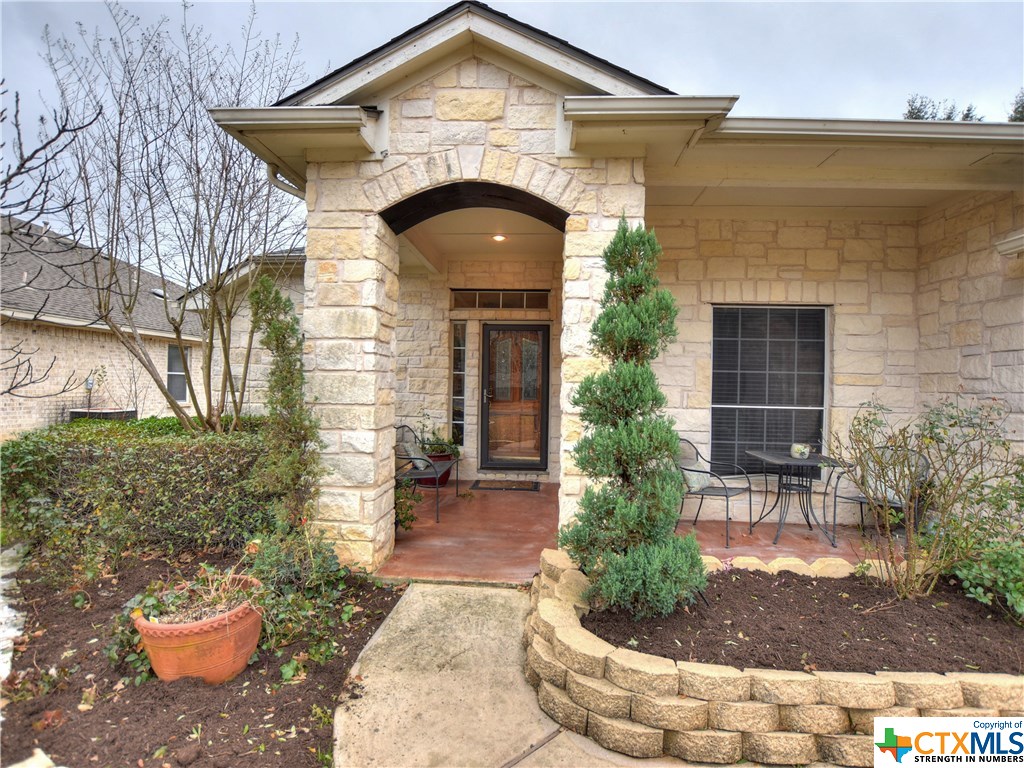3013 Bent Tree Loop Round Rock, TX 78681 - Photo 1 of 1 a front view of a house with garden