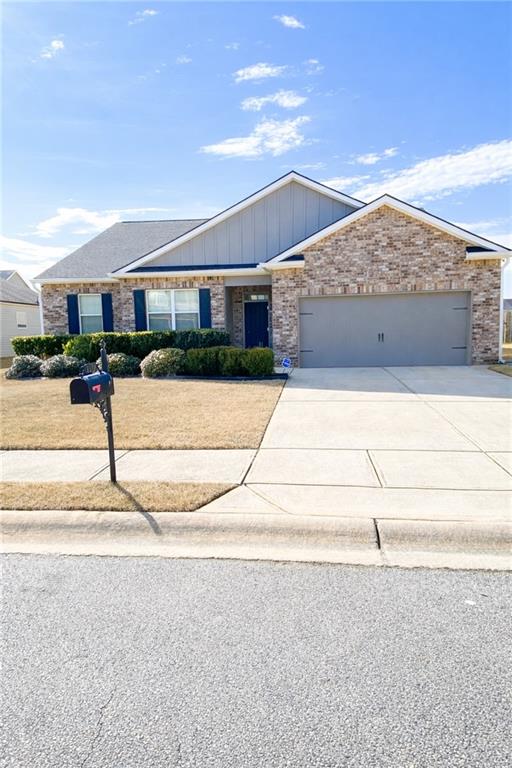 2108 Sawgrass Drive Hampton, GA 30228 - Photo 1 of 1 a front view of a house with a yard