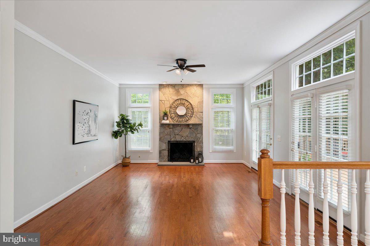 7411 Union Ridge Road Clifton, VA 20124 - Photo 11 of 86 Great room with stone fireplace opens from kitchen