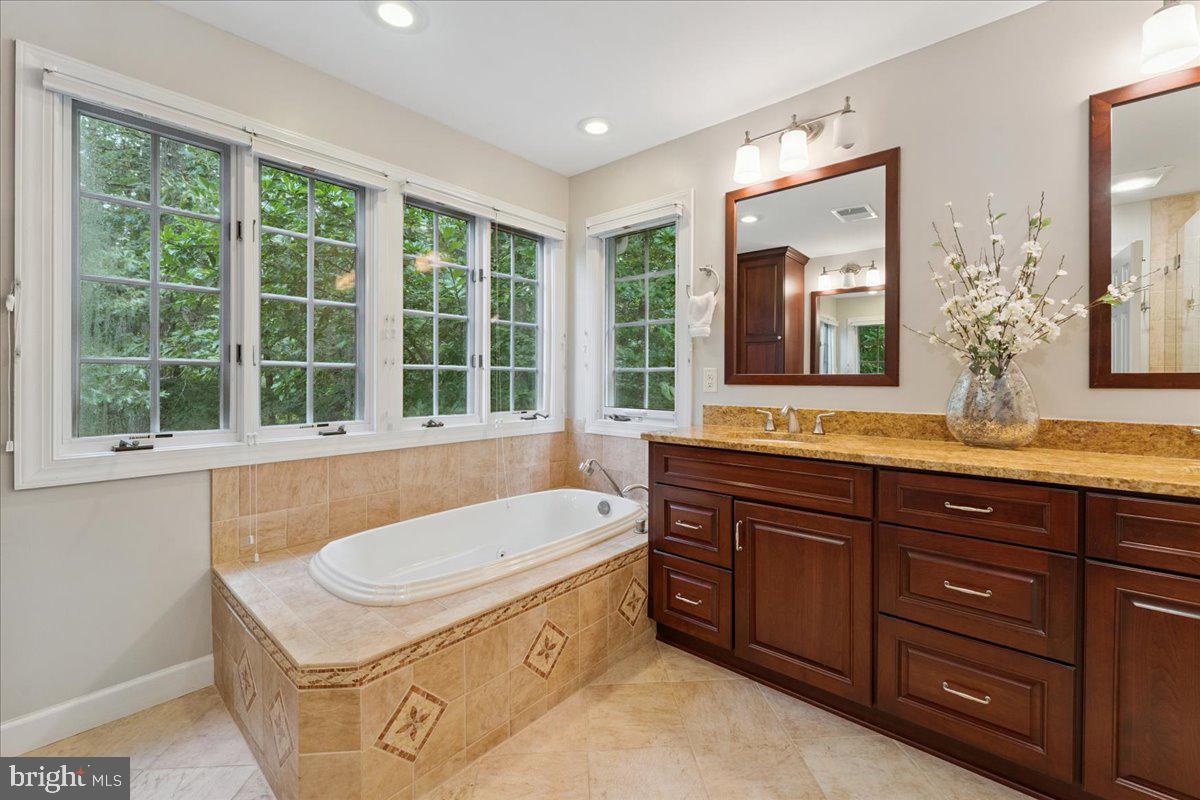 7411 Union Ridge Road Clifton, VA 20124 - Photo 31 of 86 Deep soaking tub surrounded by windows w/views!