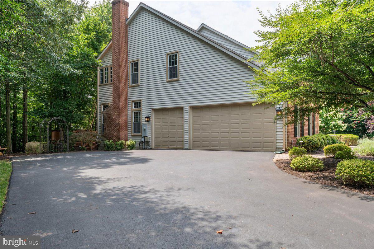 7411 Union Ridge Road Clifton, VA 20124 - Photo 59 of 86 3-car side-load garage & huge parking pad!