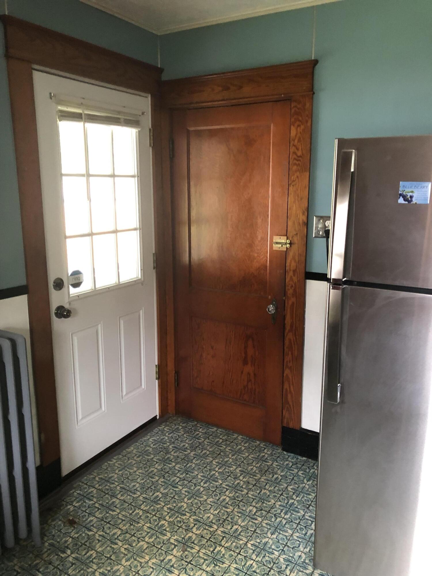 351 Main Street Mexico, ME 04257 - Photo 11 of 32 Back porch and cellar doors in kitchen