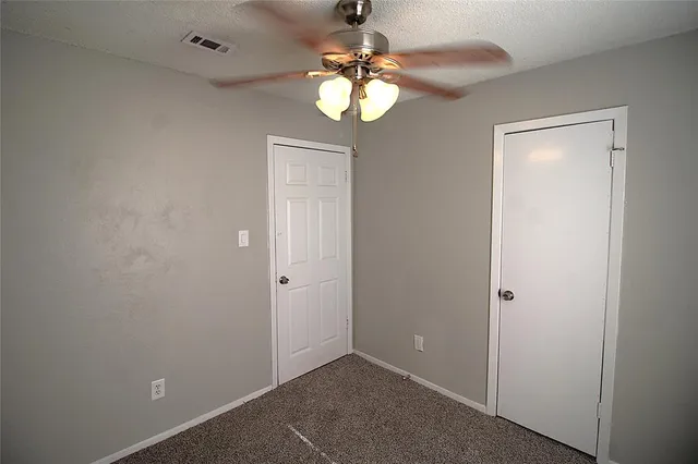 a view of a chandelier in a room